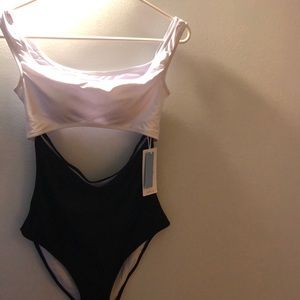 Bathing suit. Unworn (liner & tags in place)